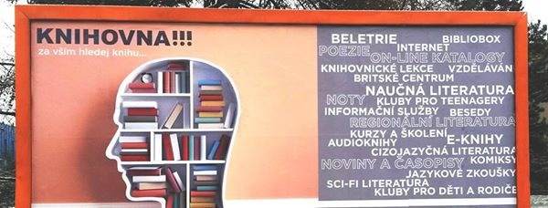 Billboard se sloganem Za vším hledej knihu pro Knihovnu města Ostravy