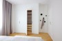 Úložné prostory v ložnici | interiérový design elegantního bytu, Londýnská