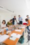 Účastníci workshopu při společném hledání řešení